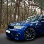 1M style Front Bumper for BMW E81 / E82 / E87 / E88 (04-13), without PDC and without washer holes