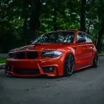 1M style Front Bumper for BMW E81 / E82 / E87 / E88 (04-13), without PDC and without washer holes